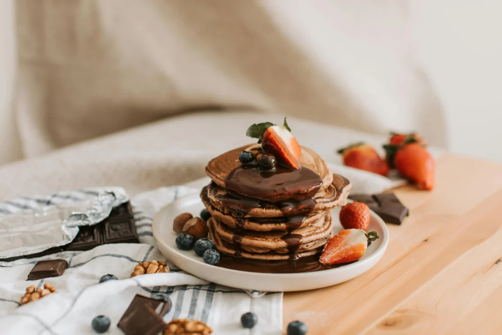 A close-up of a chocolate chip pancake