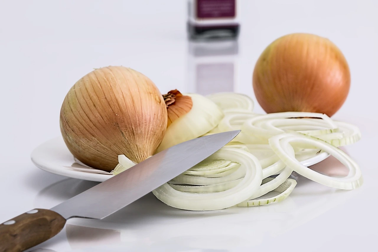 onions simmering in a pot of seasoned broth, releasing their natural sweetness and aroma